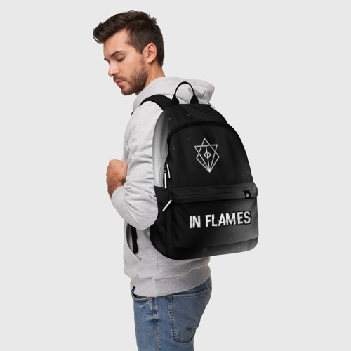 Рюкзак 3D с принтом In Flames glitch на темном фоне: символ, надпись, фото на моделе #1